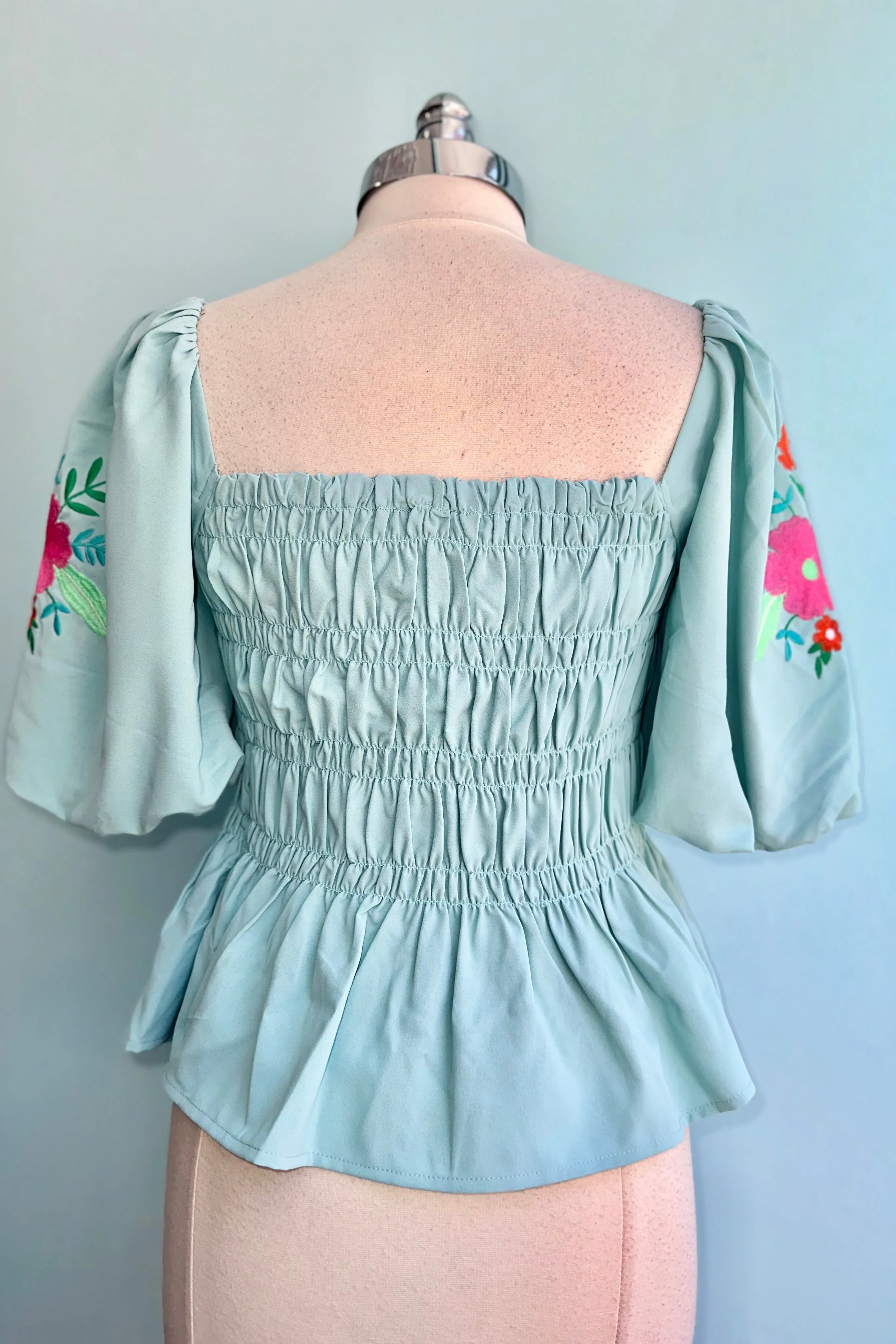 Aqua Embroidered Puff Sleeve Peplum Top